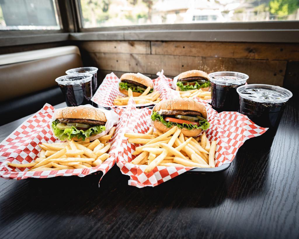 Family Pack Combo · 4 burgers, 4 fries, 4 drinks.
