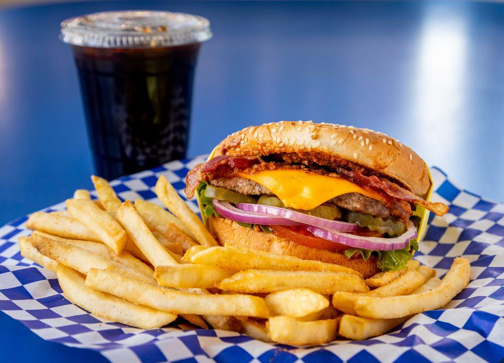 Bacon Chili Cheeseburger Combo · Sesame seed bun, hamburger patty, crispy bacon, homemade chili, American cheese, lettuce, tomato, red onions, pickles, and 1000 Island dressing. Comes with French fries and a drink.