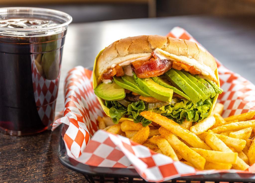 Double Avocado Bacon Cheeseburger Combo · Sesame seed bun, double hamburger patty, crispy bacon, fresh avocado, American cheese, lettuce, tomato, red onions, pickles, and 1000 Island dressing. Comes with French fries and a drink.