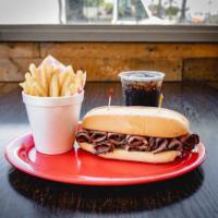 Pastrami Sandwich Combo · Juicy pastrami, mustard, and pickles on a French roll. Comes with French fries and a drink.