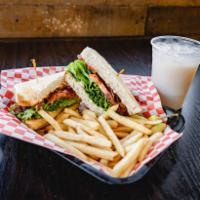 BLT Combo · Crispy bacon, lettuce, tomato, and mayo on choice of toast. Comes with French fries and a dr...