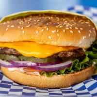Cheeseburger · Sesame seed bun, hamburger patty, American cheese, lettuce, tomato, red onions, pickles, and...