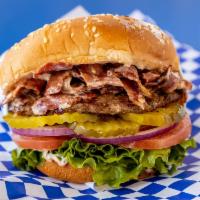 Colossal Burger · Sesame seed bun, hamburger patty, pastrami, lettuce, tomato, red onions, pickles, and 1000 I...