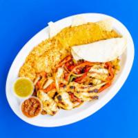 Chicken Fajitas · Grilled chicken breast with red and green bell peppers and onions, served with home-made ric...