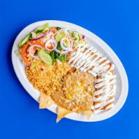 Enchilada Plate · 2 pieces enchiladas cooked in a spicy Mexican ranchera sauce; filled with choice of meat, an...