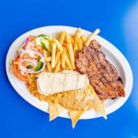 Steak Dinner · Choice of 1 or 2 pieces of grilled ribeye steak. Served with our refried beans, homemade ric...