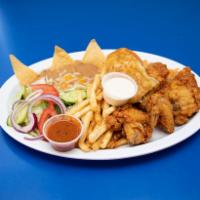 Fried Chicken Dinner · 4 pieces of fried chicken served with home-made rice, refried beans, French fries, a small g...