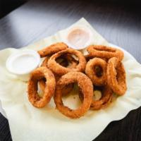 Onion Rings · Hand-breaded. Deep-fried until golden brown.
