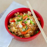Achiote Chicken Fried Rice · Achiote chicken, chorizo, jicama slaw, roasted red peppers, edamame, green onion, soy sauce,...