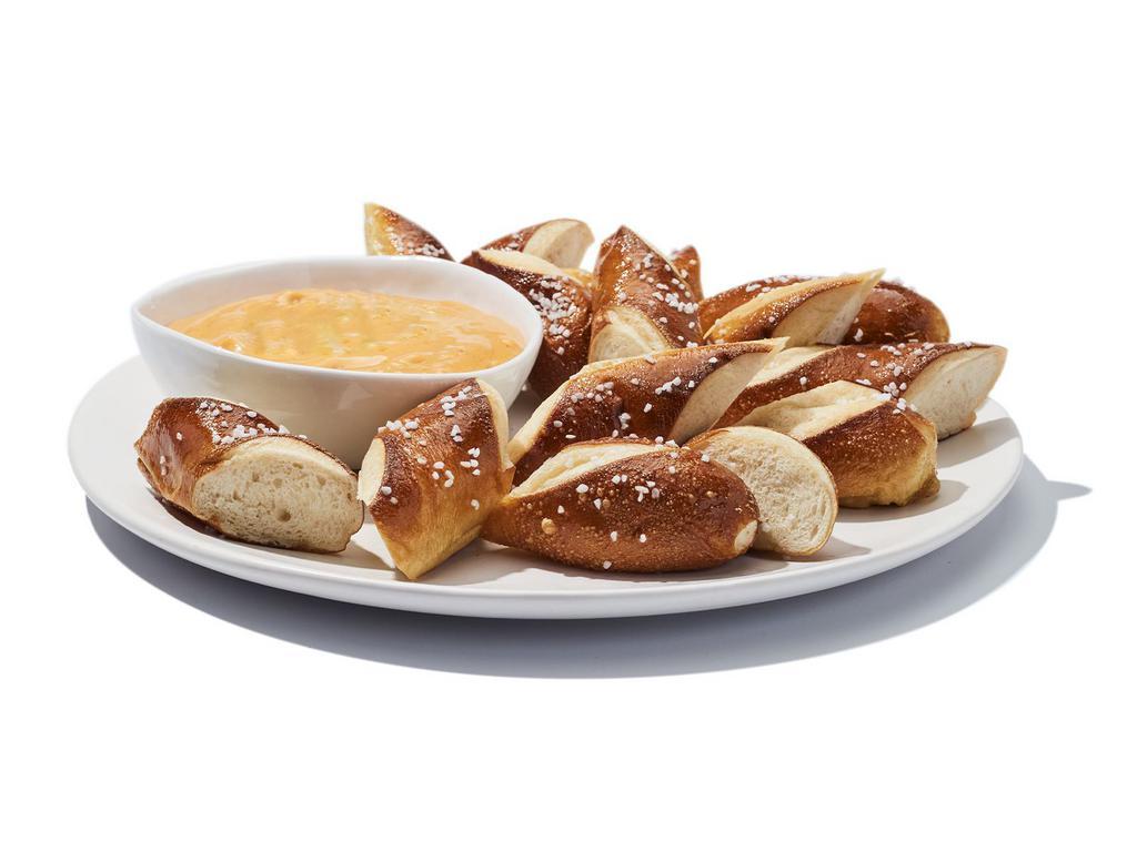Beer Cheese ＆ Pretzels · Creamy cheese gets a shot of stout beer, and is served up with salted Bavarian pretzels. It’s beer. It’s cheese. It’s cheese. What’s not to love?