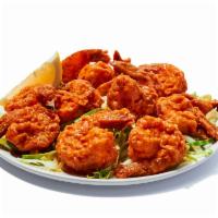 Hooters Original Buffalo Shrimp · Hooters was born at the beach in Florida so it didn’t take long before fans started asking f...