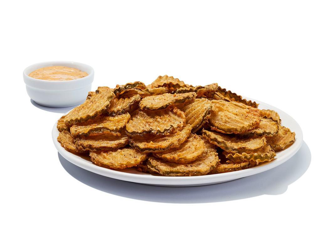 Hooters Original Fried Pickles · Yep, we take pickled pickles, fry ’em up to order and serve ’em up with a tangy dipping sauce. 