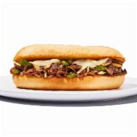 Philly Cheesesteak Sandwich · Yo, Adrian ... I made you a sandwich! Steak or chicken topped with sautéed onions, green pep...