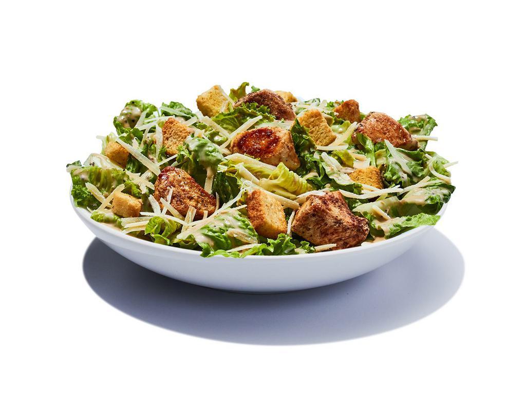 Caesar Salad · Chopped Romaine, Parmesan cheese and crispy seasoned croutons with acreamy Caesar dressing. Toppedn with grilled or fried chicken.