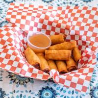 Lumpia Shanghai-Mini Egg Rolls · Hand-rolled mini egg rolls fried, filled with ground pork or chicken, carrots, comes with sw...