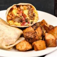 Fried Chicken Breakfast Burrito. · Three eggs scrambled, cheddar, hand-cut fries, pico de gallo, flour tortilla, choice of side