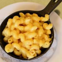 House-made Mac 'n Cheese. · Noodles, cream, cheddar
