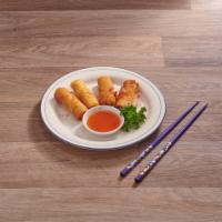 Fried Egg Rolls (4 Pieces) · Deep-fried egg rolls, stuffed with carrots, onions, and black mushrooms.  Served with sweet ...