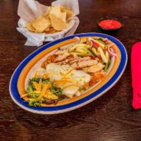 Chicken and Enchiladas · A 1/4 lb. of mesquite-grilled sliced fajita chicken served over grilled onions and drizzled ...