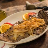 34. Bistec Encebollado  · Top round steak topped with onions.