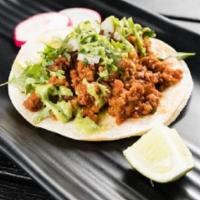 Chorizo Taco · Mexican sausage. Served with cilantro, onions, radish and lime. Spicy.