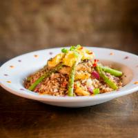 Quinoa Veggie Chaufa · Fried rice. Made with flavorful wok fried quinoa and rice, egg and a mixture of sauteed fres...