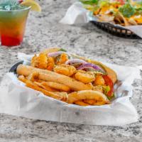 Shrimp Po Boy · Deep fried shrimp topped with 656 remoulade sauce, lettuce, and tomatoes.
