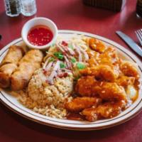 #15. *General Tso's Chicken Combination 十五 · Served spicy, general tsos chicken (with yellow onions & green pepper), 2 egg roll, pork ric...