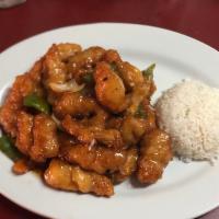 *General Tso's Chicken 左鸡 · Lightly breaded chicken, onions, and green pepper stir fried in house tangy and spicy sauce....