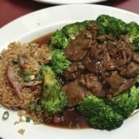 Teriyaki Beef 日本牛 · Beef stir fried in teriyaki sauce, garnished with broccoli. Served with steamed rice, pork f...