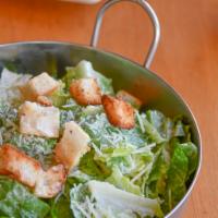 Market Caesar Salad · Romaine, parmesan, crouton, Caesar dressing. Add fire grilled chicken breast +3
