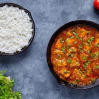  मेमने विंदालू  Lamb Vindaloo ( Boneless ) Halal Gluten Free · Fresh pieces of lamb cooked in spicy tangy sauce with potatoes. Served with basmati rice. Gl...