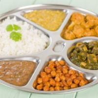 शुद्ध शाकाहारी महारानी थीली  Maharani  Vegetable Thali · Choice of any 2 for vegetable entrees. Served with basmati rice and 2 made-to-order tandoori...