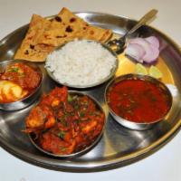 दरबारी थाली (सब्जी और मांस)  Darbari Thali ( Vegetable & Meat ) · Choice of 1 meat entree and 1 vegetable entree. Served with basmati rice and 2 made-to-order...