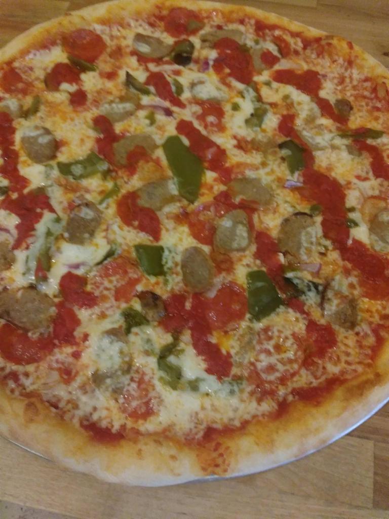 Supreme pie  · Pepperoni sausage peppers and onions 