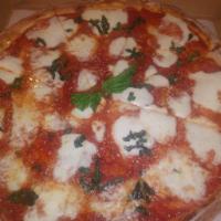 Margherita Pizza  · Fresh mozzarella and sauce