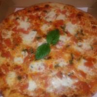 Pizza  bruschetta · Roma tomatoes, fresh chopped garlic, pecorino romano cheese &fresh mozzarella topped w olive...