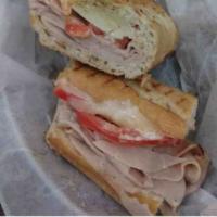 Ciuppi Panini · Oven roasted turkey, choice of cheese, tomatoes and creole mustard and mayo.