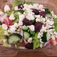 Greek salad  · Fresh lettuce , olives , feta cheese , onions ,bell peppers, cucumbers and tomatoes. Served ...