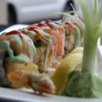 Geisha Roll · Shrimp tempura, crabmeat, and cucumber, with salmon and avocado on top with 4 kinds of sauce.
