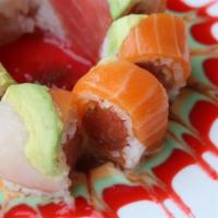 Apple Roll · Spicy tuna, avocado, and cucumber, wrapped with soy paper and rice, with tuna, salmon, yello...