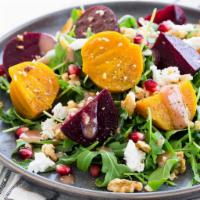 Goat Cheese and Beets Salad · Mixed mesclun greens, cherry tomatoes, cranberries, avocado, glazed walnuts, red beets, topp...