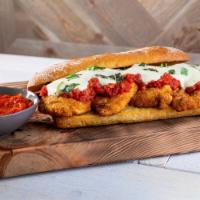 Chicken Fingers Parmigiana Sandwich · Chicken fingers with melted mozzarella and homemade marinara sauce, served on a garlic toast...