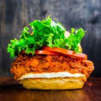 Spicy Crispy Chicken Sandwich · Crispy chicken tenders, swiss cheese, buffalo sauce, lettuce and tomato. Served on a toasted...