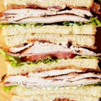 The Club (Turkey Or Tuna) · Triple Decker Turkey Salad Sandwich, Bacon, lettuce, tomatoes, cheddar cheese, or your choic...