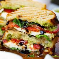 Italian Panini (Wrap Or Panini) · Mozzarella Cheese, Sautéed Tomatoes & Peppers, Fresh Basil, Sun-Dried Tomatoes, Topped With ...