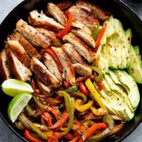 Chicken Fajitas · Marinated strips of chicken sautéed with onions, peppers and mushrooms. Served with homemade...