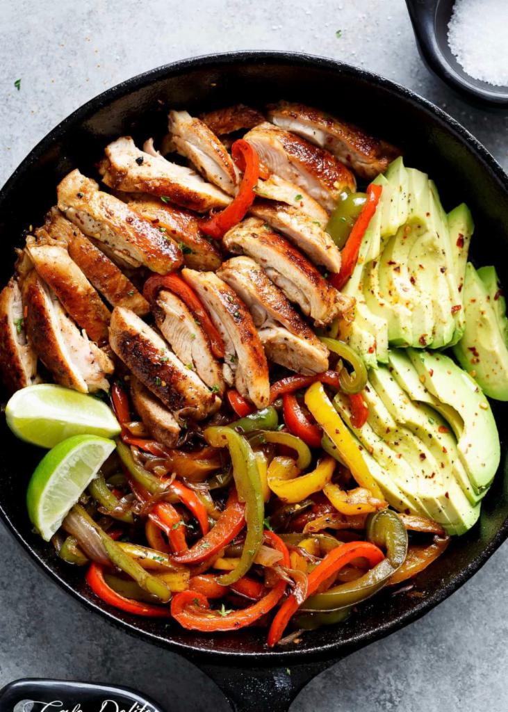 Chicken Fajitas · Marinated strips of chicken sautéed with onions, peppers and mushrooms. Served with homemade black beans, rice, guacamole, avocado salsa, sour cream, flour tortillas and our traditional Pico de Gallo.