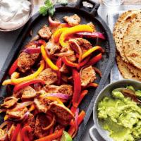 Vegetarian Fajitas · Sauteed mushrooms, onions, peppers, tomatoes, and broccoli, served with homemade black beans...