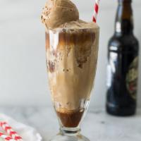 Root Beer Float · Served with a scoop of ice cream.